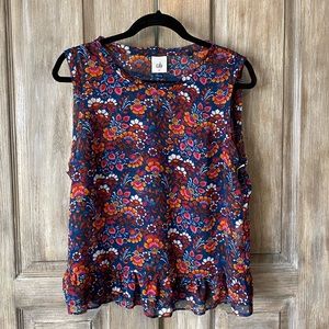 CAbi Navy floral ruffle bottom tank
